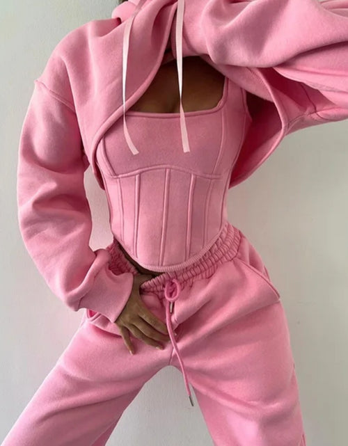Load image into Gallery viewer, (Free Shipping)(Tariffs included in price) This three-piece women's set includes a short hoodie, small vest, and belted sweatpants, featuring anti-pilling, breathable, and quick-dry properties.
