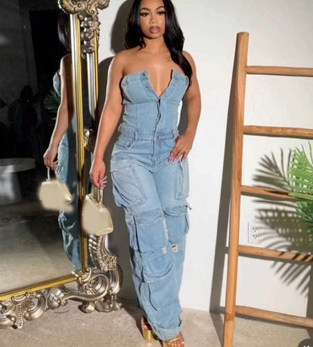 (Tariffs included in price) Plus Sizes available. Women's Romper style cargo pants jumpsuit. Sleeveless design and high waistline.