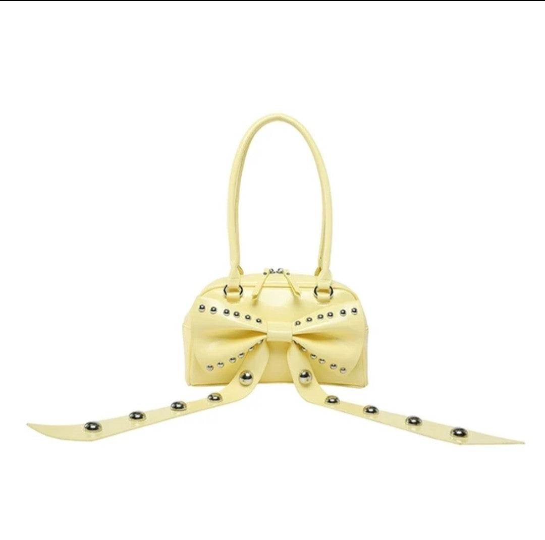 (Free Shipping)(Tariffs included in price) Women's Rivet Bolsos Mujer Motorcycle Bow Bag Underarm Shoulder Bags American Style Sac Femme New Adjustable Strap Bolso