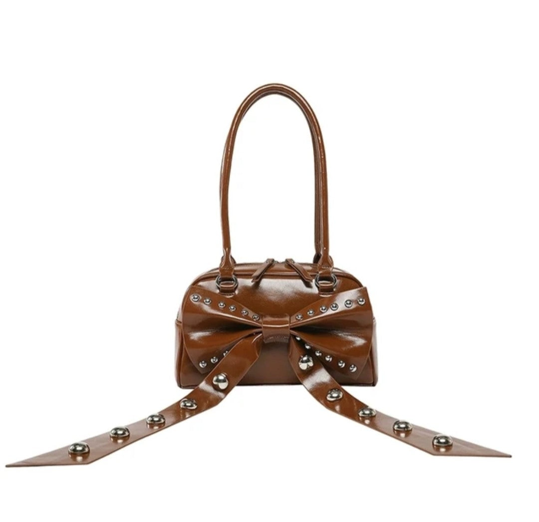 (Free Shipping)(Tariffs included in price) Women's Rivet Bolsos Mujer Motorcycle Bow Bag Underarm Shoulder Bags American Style Sac Femme New Adjustable Strap Bolso