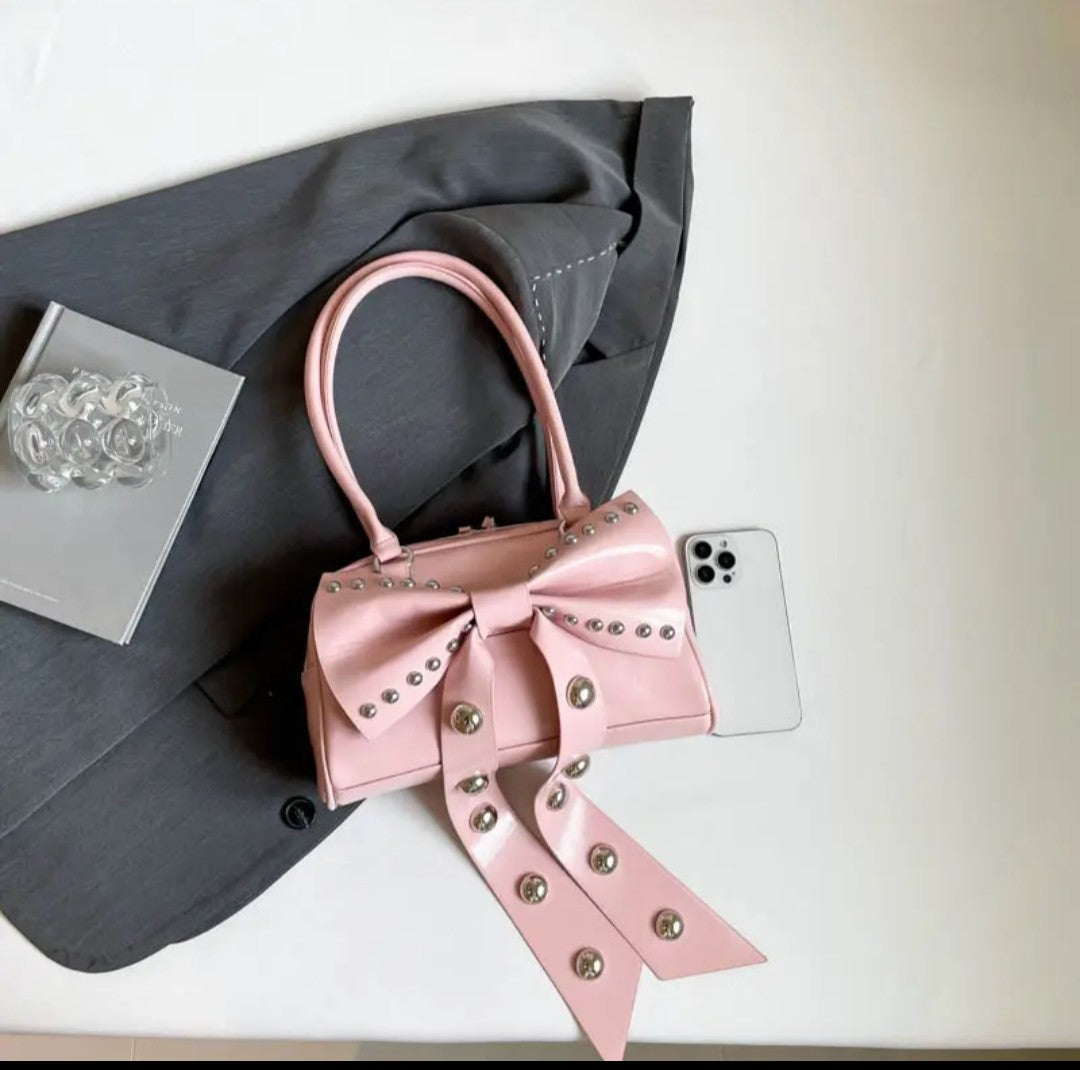 (Free Shipping)(Tariffs included in price) Women's Rivet Bolsos Mujer Motorcycle Bow Bag Underarm Shoulder Bags American Style Sac Femme New Adjustable Strap Bolso