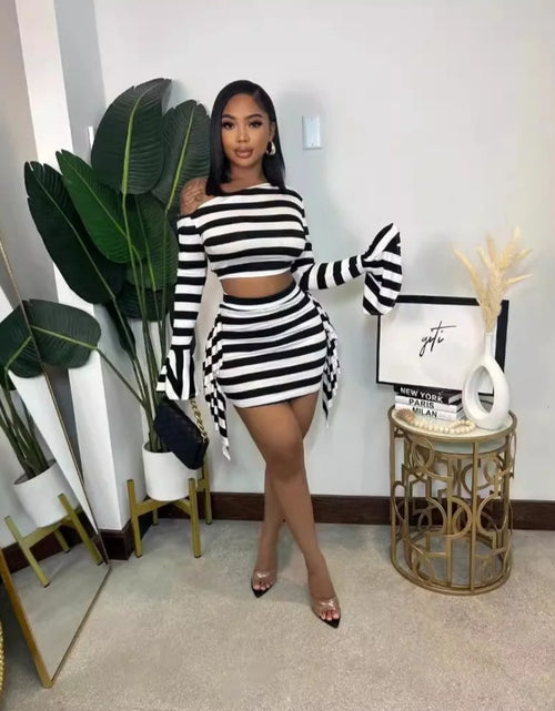 Load image into Gallery viewer, (Free Shipping)(Tariffs included in price) New Shoulder Flare Sleeve Fringe Skirt Black and White Stripe Two-piece Set
