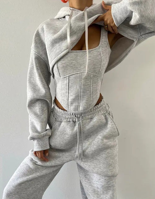Load image into Gallery viewer, (Free Shipping)(Tariffs included in price) This three-piece women's set includes a short hoodie, small vest, and belted sweatpants, featuring anti-pilling, breathable, and quick-dry properties.
