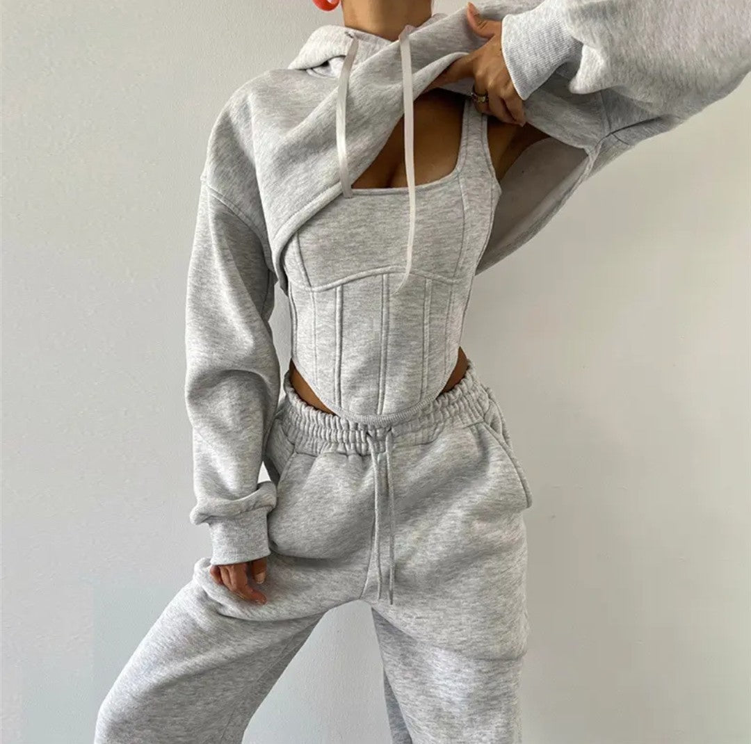 (Free Shipping)(Tariffs included in price) This three-piece women's set includes a short hoodie, small vest, and belted sweatpants, featuring anti-pilling, breathable, and quick-dry properties.