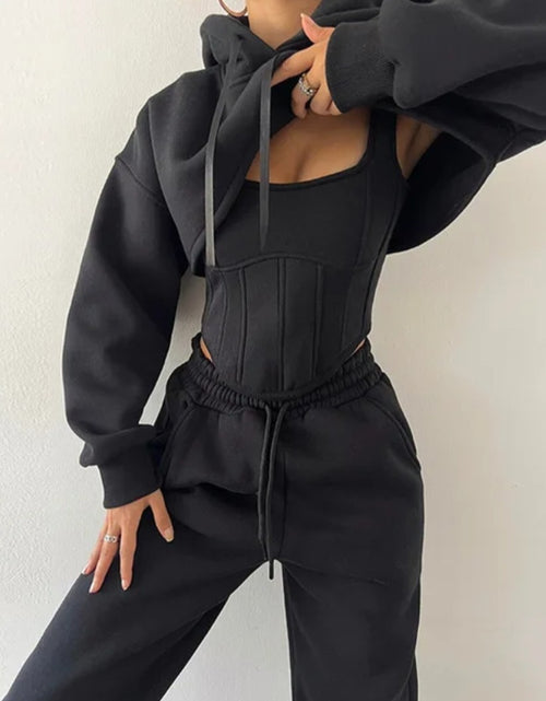 Load image into Gallery viewer, (Free Shipping)(Tariffs included in price) This three-piece women's set includes a short hoodie, small vest, and belted sweatpants, featuring anti-pilling, breathable, and quick-dry properties.

