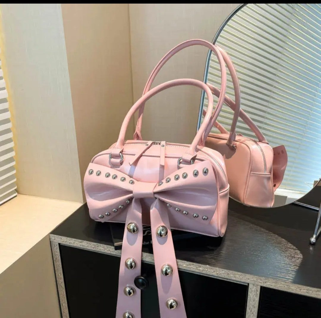 (Free Shipping)(Tariffs included in price) Women's Rivet Bolsos Mujer Motorcycle Bow Bag Underarm Shoulder Bags American Style Sac Femme New Adjustable Strap Bolso