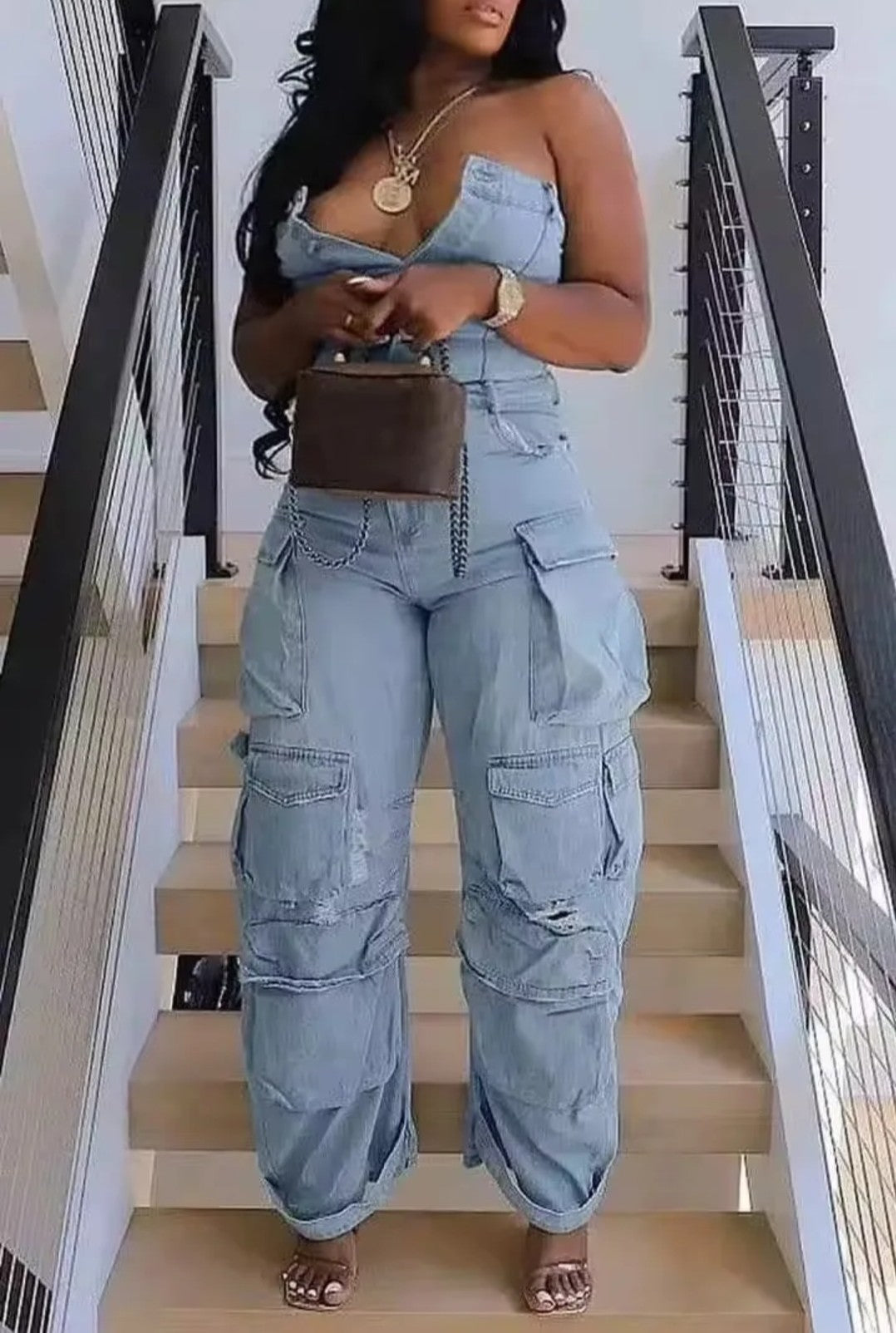 (Tariffs included in price) Plus Sizes available. Women's Romper style cargo pants jumpsuit. Sleeveless design and high waistline.