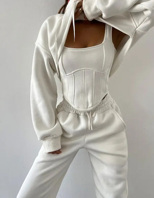 Load image into Gallery viewer, (Free Shipping)(Tariffs included in price) This three-piece women's set includes a short hoodie, small vest, and belted sweatpants, featuring anti-pilling, breathable, and quick-dry properties.
