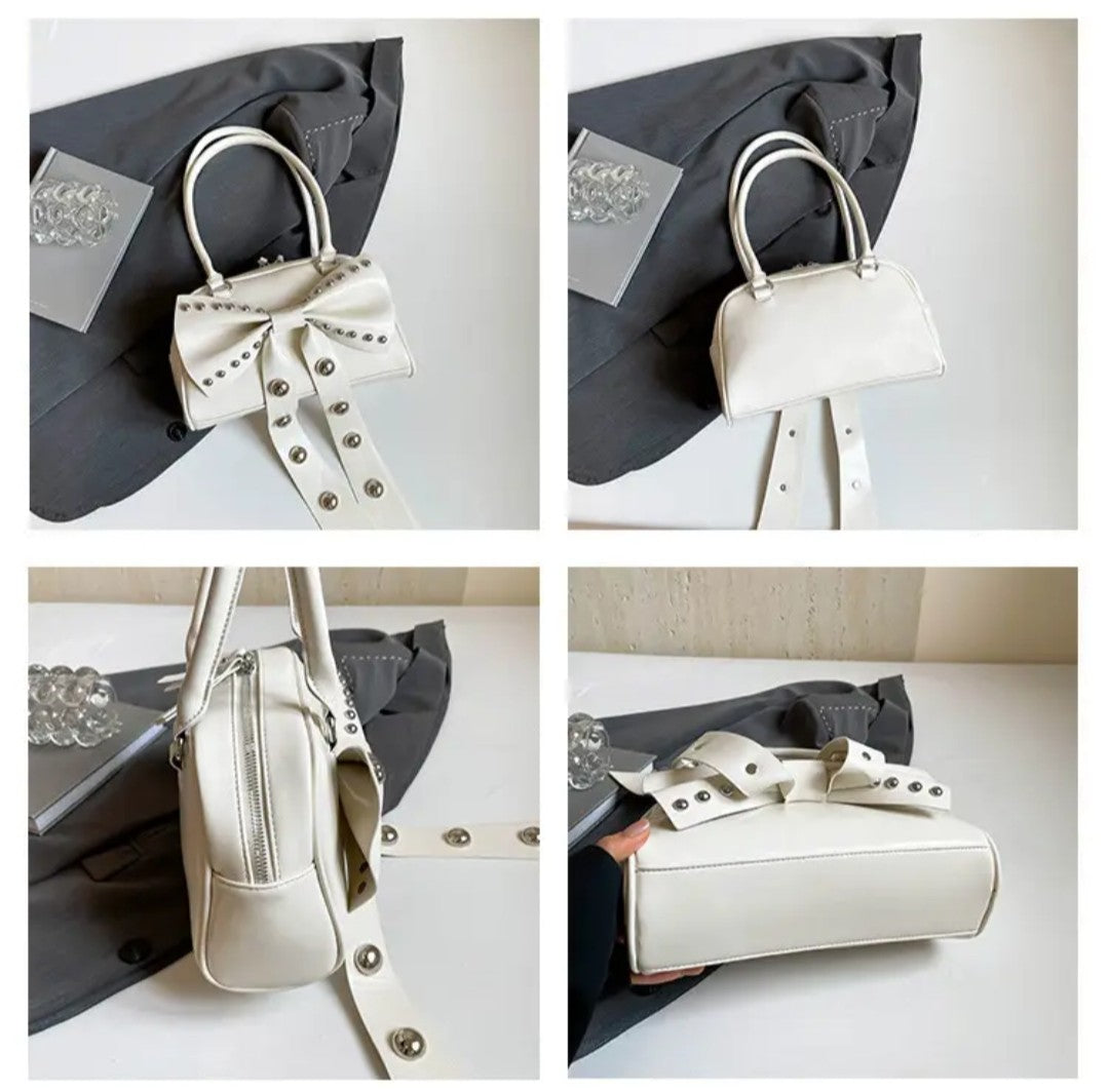 (Free Shipping)(Tariffs included in price) Women's Rivet Bolsos Mujer Motorcycle Bow Bag Underarm Shoulder Bags American Style Sac Femme New Adjustable Strap Bolso