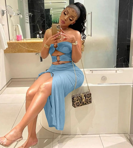 (Free Shipping)(Tariffs included in price) Women Dress Buckles with umbilical hollowed out bifurcate and pleated sexy dress cut-out at the waist and a high slit