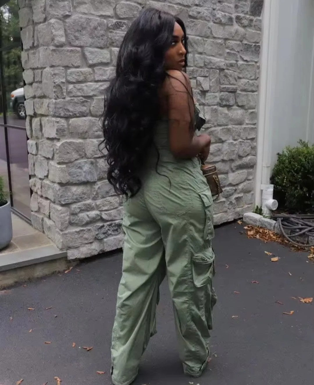 (Tariffs included in price) Plus Sizes available. Women's Romper style cargo pants jumpsuit. Sleeveless design and high waistline.