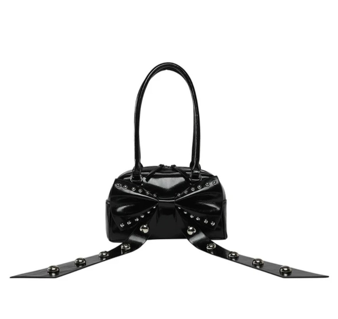 (Free Shipping)(Tariffs included in price) Women's Rivet Bolsos Mujer Motorcycle Bow Bag Underarm Shoulder Bags American Style Sac Femme New Adjustable Strap Bolso