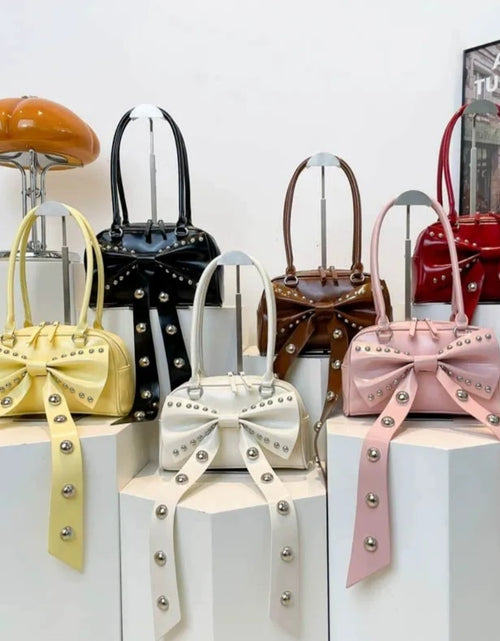 Load image into Gallery viewer, (Free Shipping)(Tariffs included in price) Women's Rivet Bolsos Mujer Motorcycle Bow Bag Underarm Shoulder Bags American Style Sac Femme New Adjustable Strap Bolso
