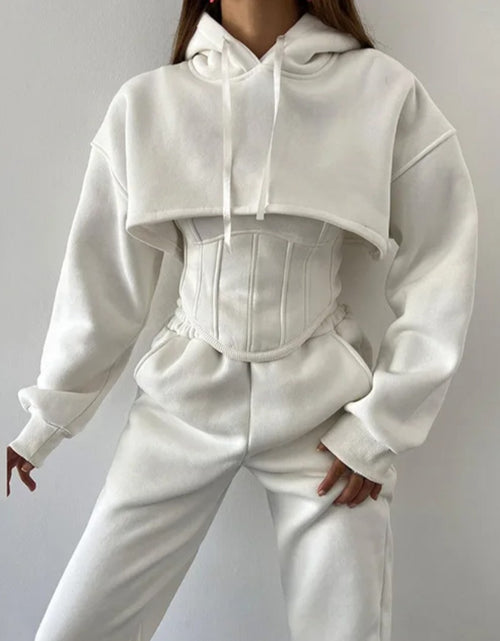 Load image into Gallery viewer, (Free Shipping)(Tariffs included in price) This three-piece women's set includes a short hoodie, small vest, and belted sweatpants, featuring anti-pilling, breathable, and quick-dry properties.
