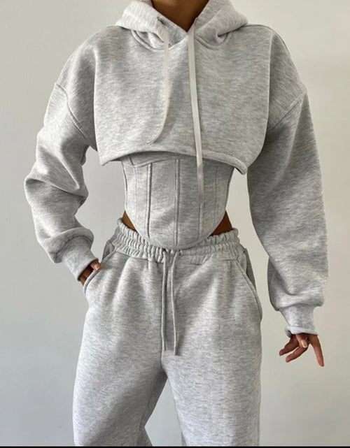 Load image into Gallery viewer, (Free Shipping)(Tariffs included in price) This three-piece women's set includes a short hoodie, small vest, and belted sweatpants, featuring anti-pilling, breathable, and quick-dry properties.
