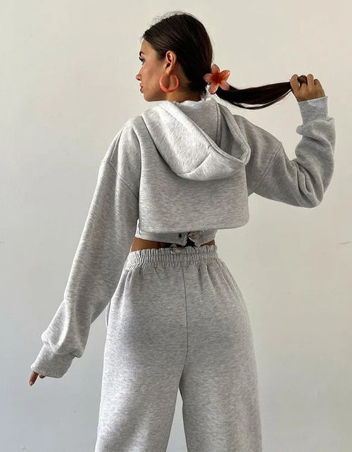 Load image into Gallery viewer, (Free Shipping)(Tariffs included in price) This three-piece women's set includes a short hoodie, small vest, and belted sweatpants, featuring anti-pilling, breathable, and quick-dry properties.

