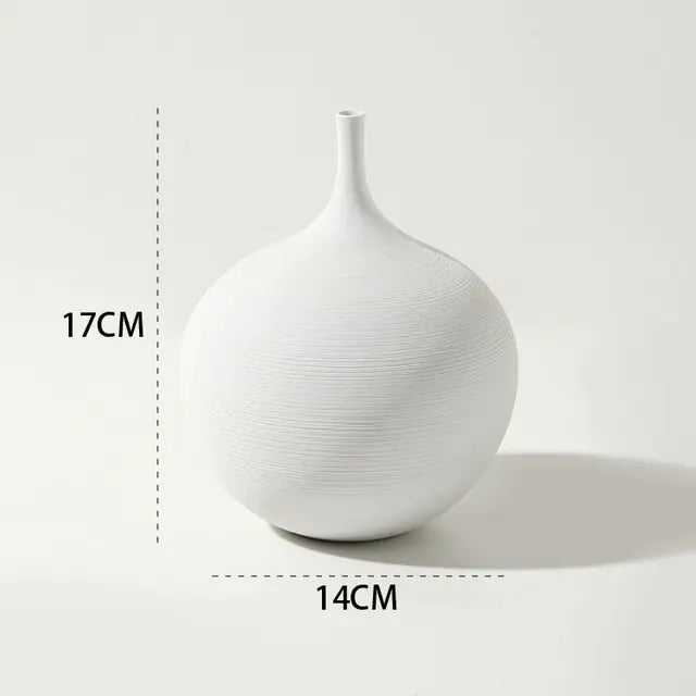 he M-sized Ceramic & Porcelain Tabletop Vase